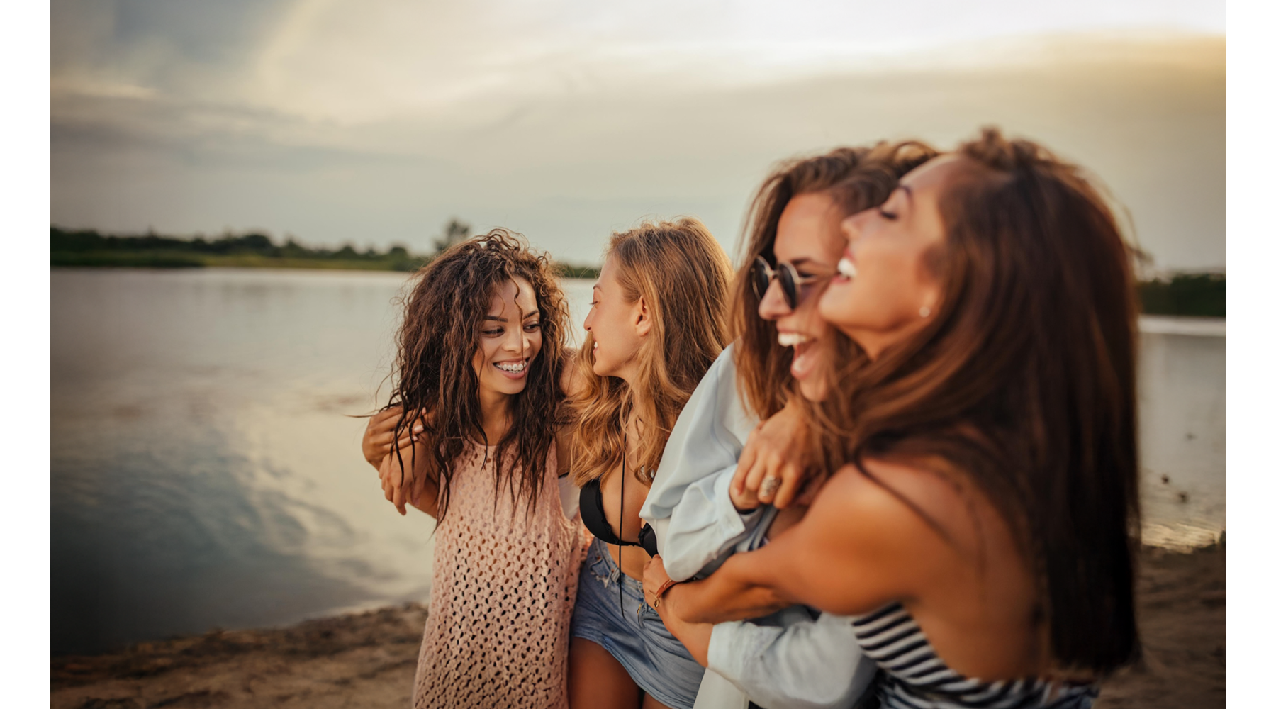 a group of friends laughing outdoors