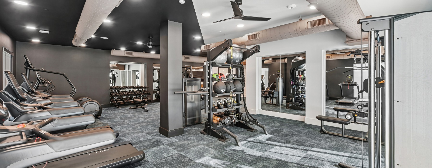 a gym with treadmills